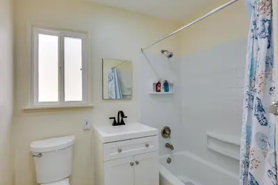a bathroom with a toilet and a sink and a shower at Centrally Located Retreat 5 Mi to San Diego Zoo! in San Diego