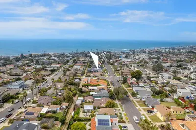 an aerial view of a city with the ocean at Luxury beach home one block from ocean with spa, WiFi, & gorgeous outdoor space in San Diego