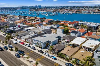 an aerial view of a city with a harbor at Historical Beach Bungalow Steps Away From Sand #5 in Newport Beach