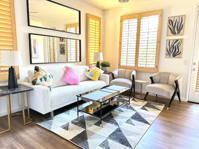 a living room with a couch and two chairs at Comfort Retreat 3B3B Villa in Quail Hill Irvine in Irvine
