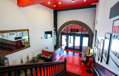 a room with a staircase and an archway at The Keating in San Diego