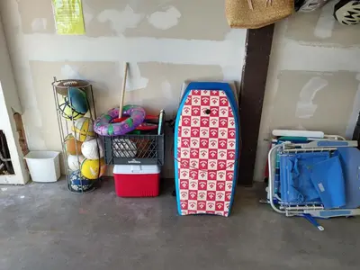 a corner of a room with luggage and other items at Charming 1Bedroom Vacation Condo in Oceanside