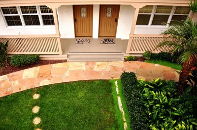 a house with a green lawn in front of it at Casa De La Playa in San Diego