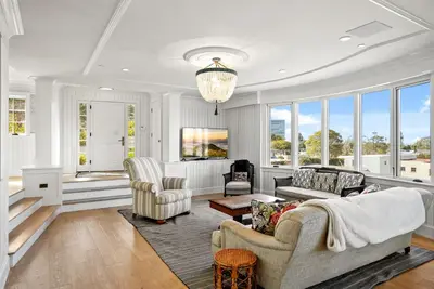 a living room with a couch and chairs and windows at Cabrillo Villa - Massive 7br La Jolla Estate in San Diego