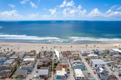 an aerial view of a city and the beach at Stunning beach home - steps2sand, AC, Large Patio and Fast Wifi! in San Diego