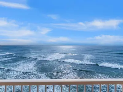 a view of the ocean from a balcony at Sunset Cliffs Lookout - Ocean Front Luxury Condo in San Diego