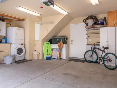 a garage with a bike parked in a room at Ocean View Beach Haven! Steps2Beach & Pet Friendly in San Diego