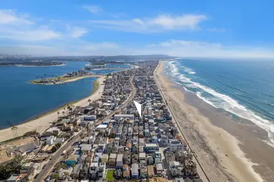 an aerial view of a beach and the ocean at Ocean View Beach Haven! Steps2Beach & Pet Friendly in San Diego
