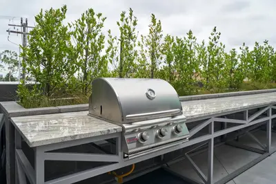 a grill sitting on top of a table on a patio at NEW Organic Modern Luxury 1BD/1BA- close to everything! in San Diego