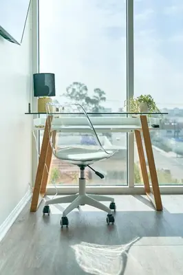 an office with a glass desk and a chair at NEW Organic Modern Luxury 1BD/1BA- close to everything! in San Diego