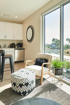 a living room with a couch and a table at NEW Organic Modern Luxury 1BD/1BA- close to everything! in San Diego