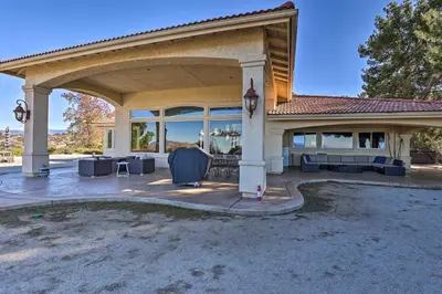 a house with a pavilion with a patio at Charming Temecula Home with Hot Tub, Mountain Views! in Temecula
