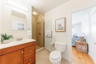 a bathroom with a toilet and a sink and a shower at CBS-501 - Cardiff Hillside Hideaway in Cardiff-by-the-Sea