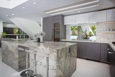 a kitchen with a large marble counter top at Amazing Views! Walk to the Beach! Pool and Spa! in San Diego