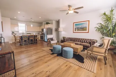 a living room with a couch and a table at Ranch House at Galway Downs in Temecula