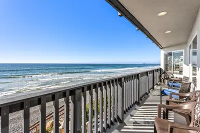 a view of the beach from the balcony of a house at Oceanfront 3-unit complex - Private Deck - BBQ in Oceanside