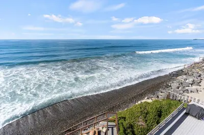 an overhead view of a beach with the ocean at Oceanfront 3-unit complex - Private Deck - BBQ in Oceanside