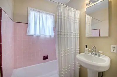 a bathroom with a sink and a toilet and a shower at Walk 2 Beach, EV Charger, Outdoor Dining, 2 Units in Carlsbad