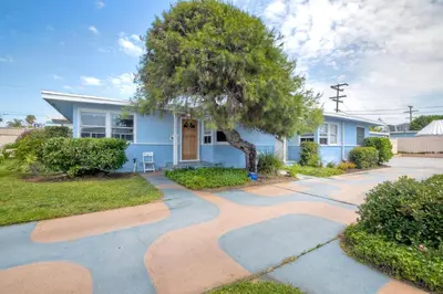 a house with a tree in front of it at Walk 2 Beach, EV Charger, Outdoor Dining, 2 Units in Carlsbad