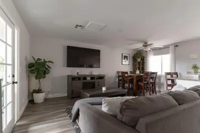 a living room with a couch and a table at Not taking reservations in Chula Vista