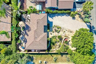 an overhead view of a house with a yard at Walk To Beach - BBQ - Fire Pit - Outdoor Dining in Carlsbad