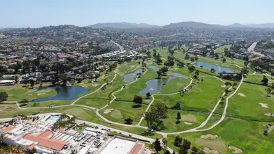 an aerial view of a park with two lakes at Private Balcony Overlooking Pool - Gated Parking in Encinitas
