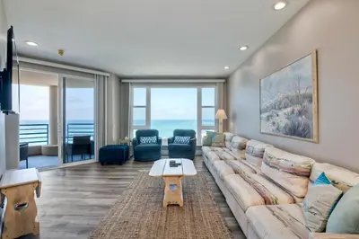 a living room with a couch and a table at 3BR Oceanview, Gated Community & Parking, Elevator in Oceanside