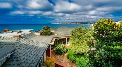 an aerial view of a house with the ocean in the background at Blue Water View Condo in Prime Coastal Locale in San Diego