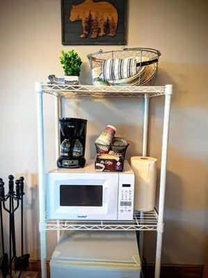 a white shelf with a microwave on top of it at #3 Howling Wolf's Lair - Cabin W/Fireplace & Views in Santa Ysabel