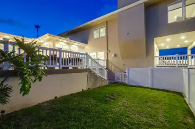 a large house with a lawn in front of it at Point Loma Serenity in San Diego