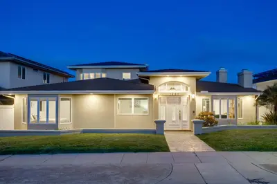 a house with a driveway in front of it at Point Loma Serenity in San Diego