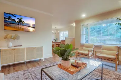 a living room with a couch and a table at Grandview 2 in Encinitas