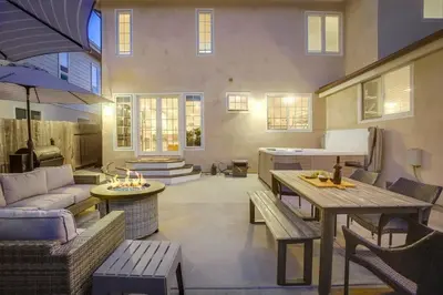 a living room with a couch and a table at Grandview 2 in Encinitas