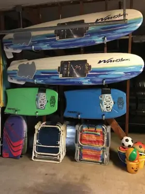 a stack of surfboards on top of each other at Beachfront Getaway on the Sand in Newport Beach