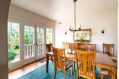 a dining room with a table and chairs at La Jolla Shores Oceanview Retreat in San Diego