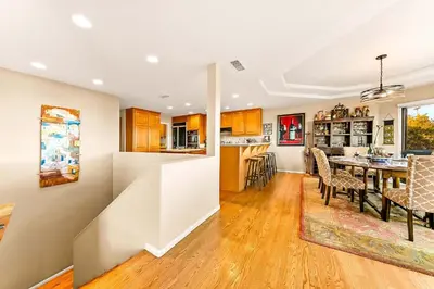 a kitchen and dining room with a table and chairs at Spacious Beautiful Home with Stunning Bay Views in San Diego