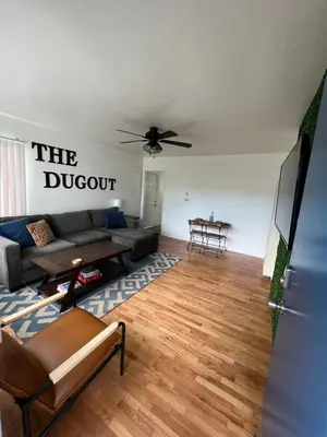 a living room with a couch and a table at The Dugout in San Diego