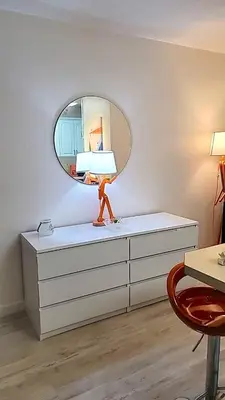 a room with a dresser with a mirror on it at Right In The Heart Of Pacific Beach in San Diego