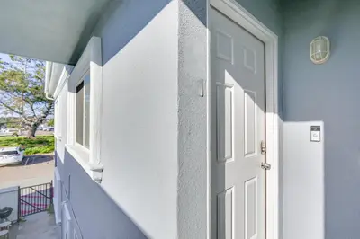 a door leading to a balcony with a view at Updated Mission Beach Condo Walk to Belmont Park! in San Diego