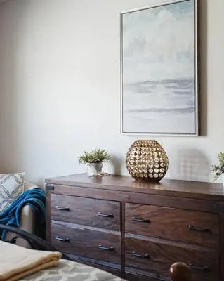 a wooden dresser in a room with a picture on the wall at Casa Italia -2BR- FREE Driveway parking for 2 cars in San Diego