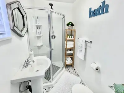 a bathroom with a shower and a sink at Hidden King Suite with Garden Parking - 4 Guest in La Mesa