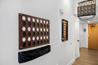 a large game of dominoes hanging on a wall at Park Lux PlayHouse in San Diego