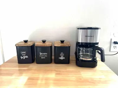 a trio of three coffee makers sitting on a counter at Minimalist 1 bed by Airport & Old Town in San Diego
