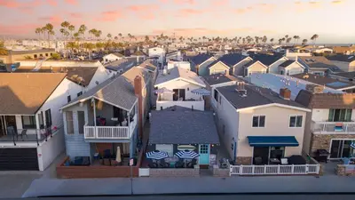 an aerial view of a town with houses at Surfrider II by AvantStay Walk to the Beach Balcony in Newport Beach