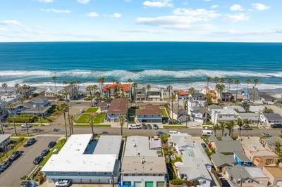 an aerial view of a town next to the ocean at O'side Palms Multi Units in Oceanside