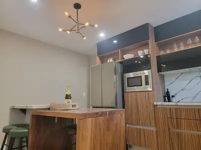 a kitchen with a counter top with a microwave at Hidden Oasis Near Safari - Wineries - Lakes in Escondido