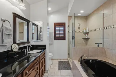 a bathroom with a tub and a sink and a shower at Peaceful Getaway with Renovated Amenities in San Diego