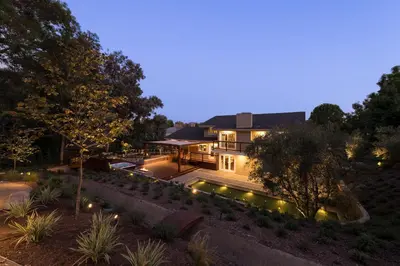 an aerial view of a house at night at The Sanctuary in Laguna Hills