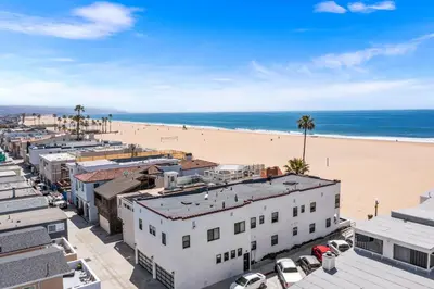 an aerial view of a beach and buildings at West Oceanfront Oasis 4 in Newport Beach