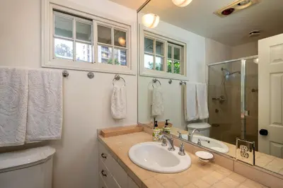 a bathroom with a sink and a shower at La Jolla Shores Family Getaway in San Diego